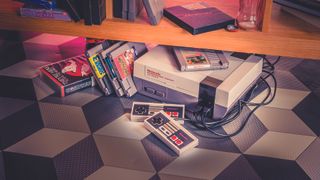 The best NES games: a screenshot of collection of NES games and a Nintendo console.